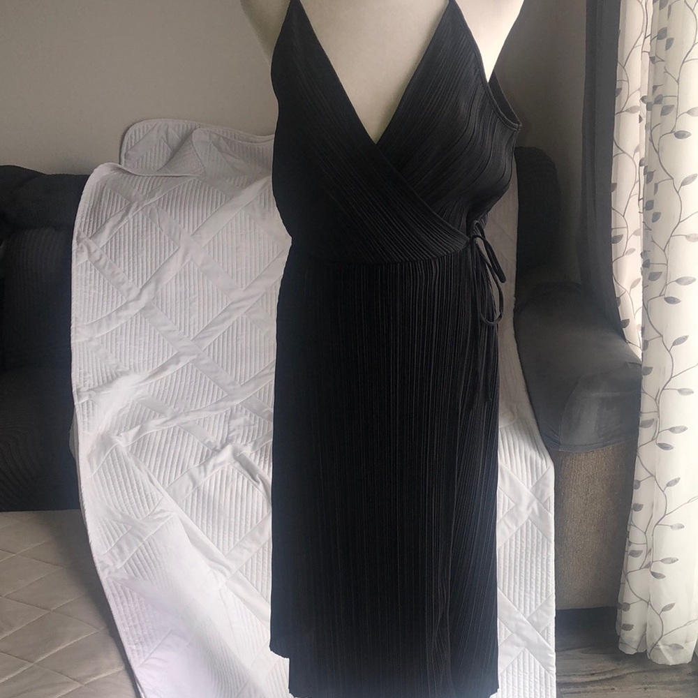 H&M women’s Elegant Black faux Wrap Dress.